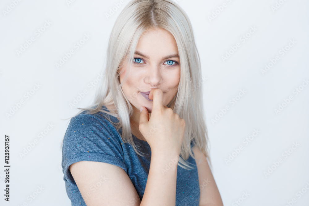 Closeup portrait of a sensual young blond woman. Closeup portrait of a sensual young blond woman.