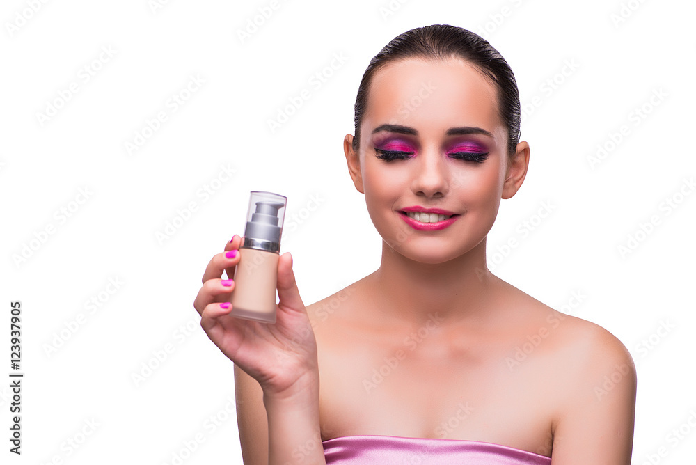Woman with a bottle of cream isolated on white Woman with a bottle of cream isolated on white