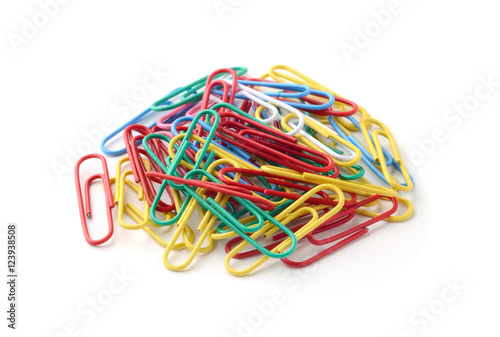 Multicolored paper clips isolated on white