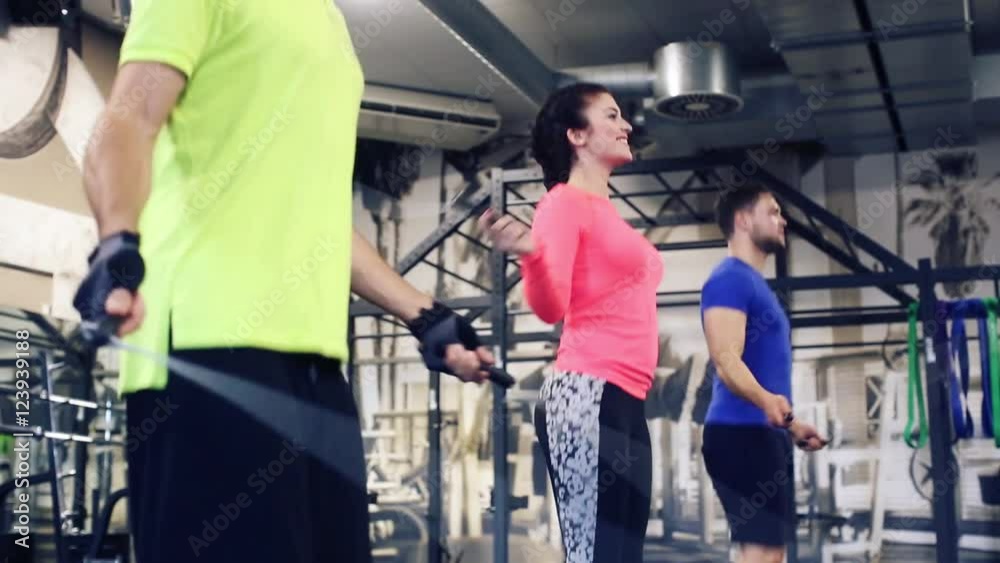 Group rope skipping in functional training gym as fitness exercise