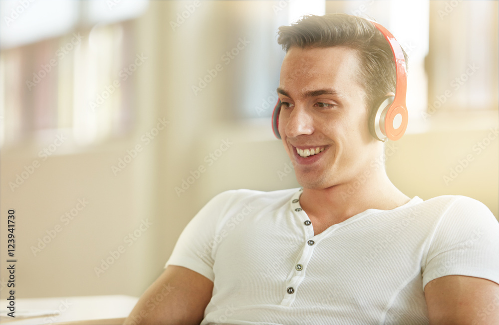 Unposed group of creative business people in an open concept office brainstorming their next project.