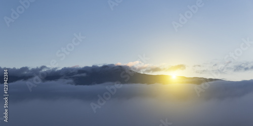 sunrise sun mountains fog