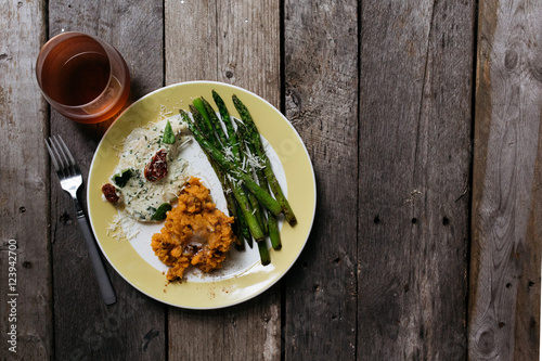 homemade creamy chicken with asparagus, sun dried tomatoes, and mashed sweet potatoes