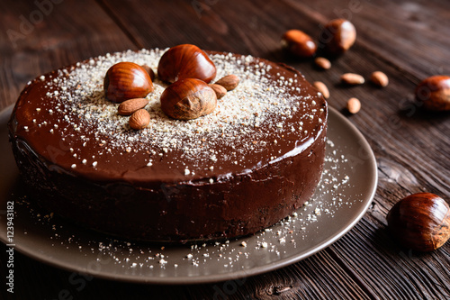 Delicious chestnut cake with almonds and chocolate glaze