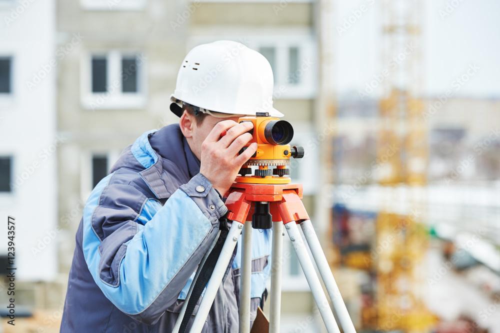 surveyor worker with theodolite
