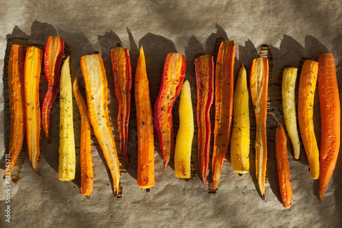 roasted colorful carrots on baking sheet