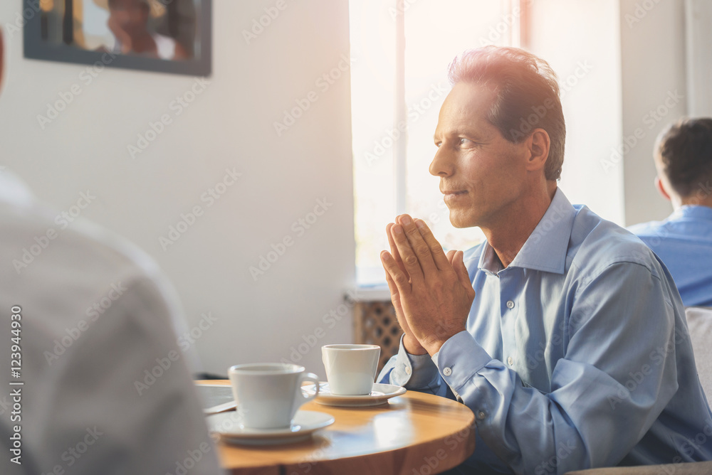 Man having coffee break in office Man having coffee break in office