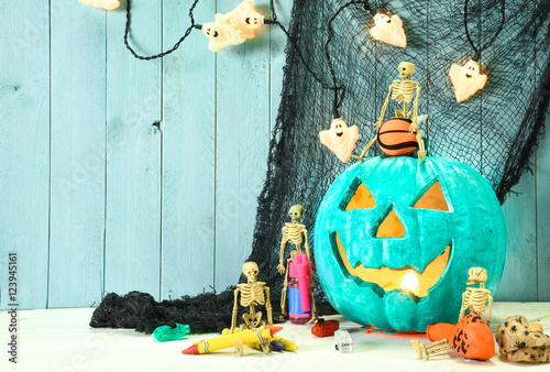 Teal Jack O Lantern  symbolizing non food treats for Halloween
