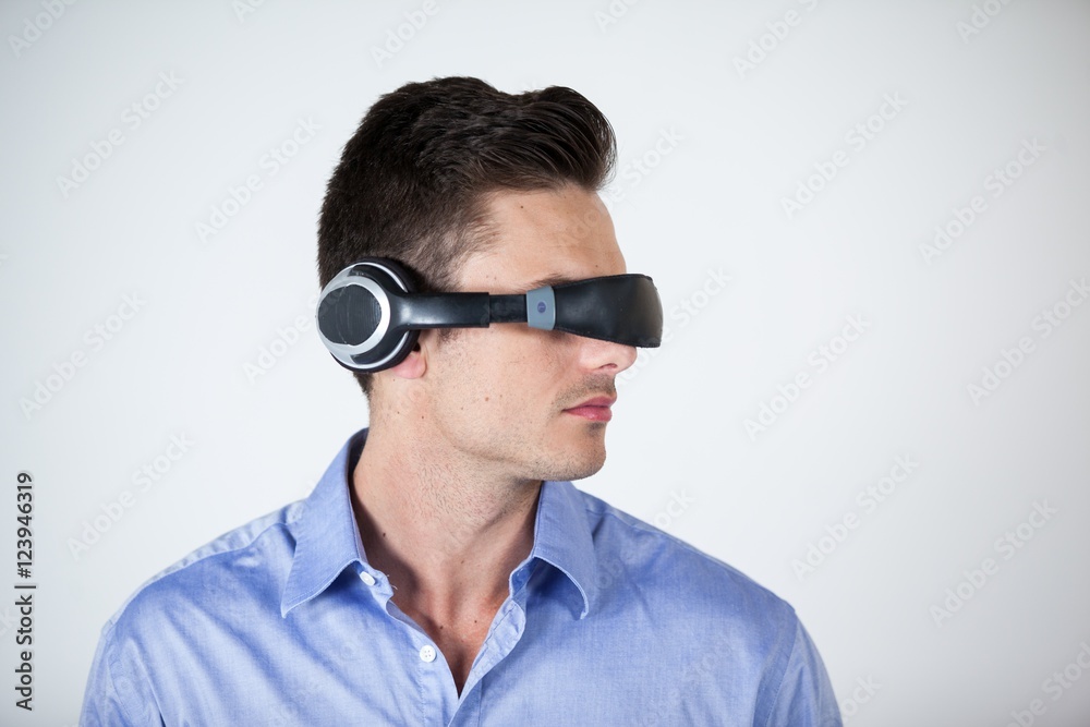 Man using virtual video glasses Man using virtual video glasses