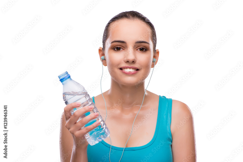 Woman doing sports with bottle of fresh water Woman doing sports with bottle of fresh water