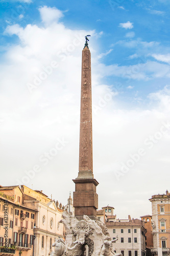 Fountain of the Four Rivers (Fontana dei Quattro Fiumi) with an Egyptian obelisk in Rome, Italy, Navona Square (Piazza Navona) 
