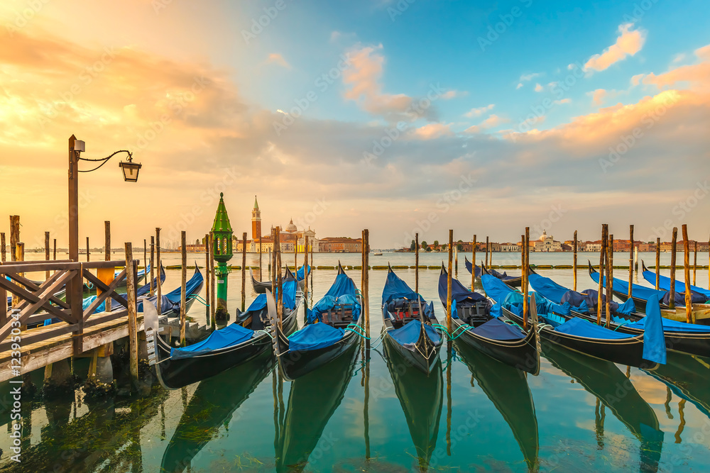 Picturesque view famous gondolas sunrise Venice Italy