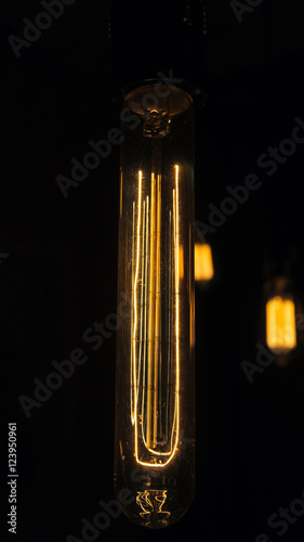 Decorative antique edison style light bulbs chandelier background