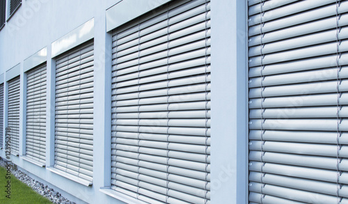 Canvastavla Curtains, blinds on the windows outside the establishment
