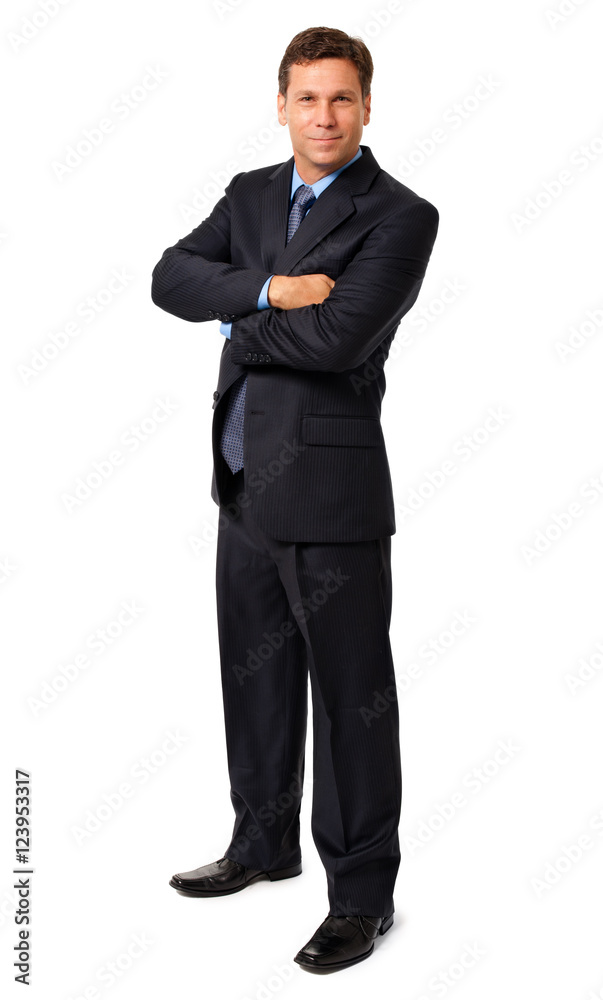 Full-length businessman in dark suit with arms crossed isolated on white background Full-length businessman in dark suit with arms crossed isolated on white background