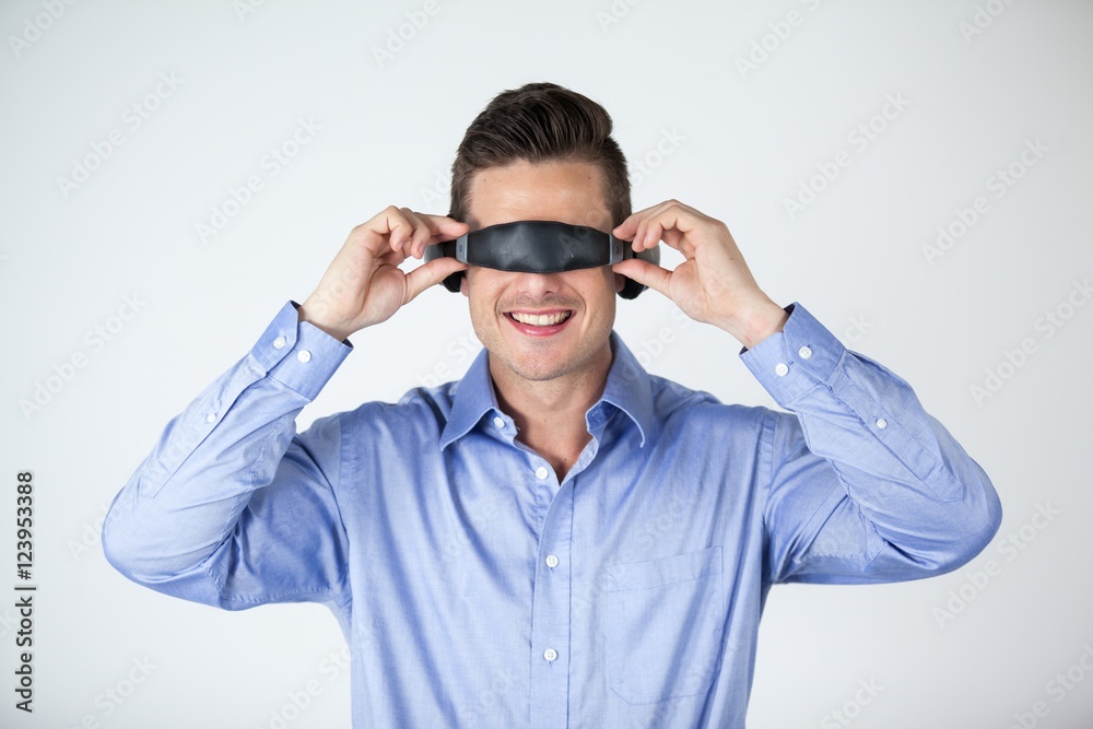 Man using virtual video glasses Man using virtual video glasses
