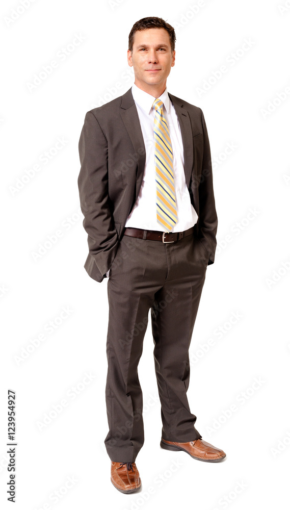 Full-length male man businessman with hands in pockets isolated on white background Full-length male man businessman with hands in pockets isolated on white background