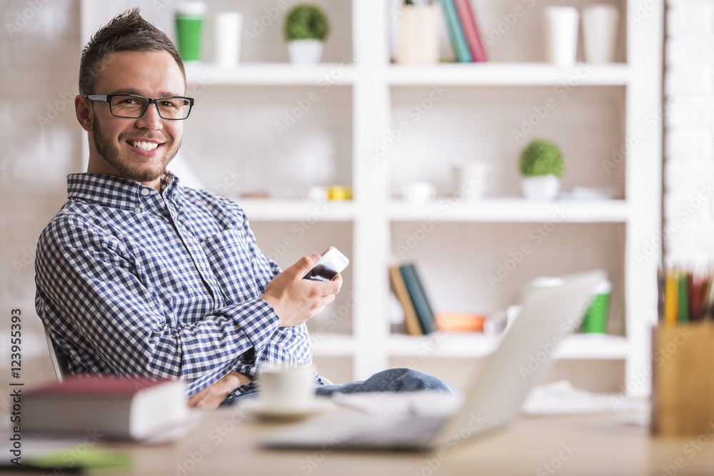 Attractive man using cell phone Attractive man using cell phone