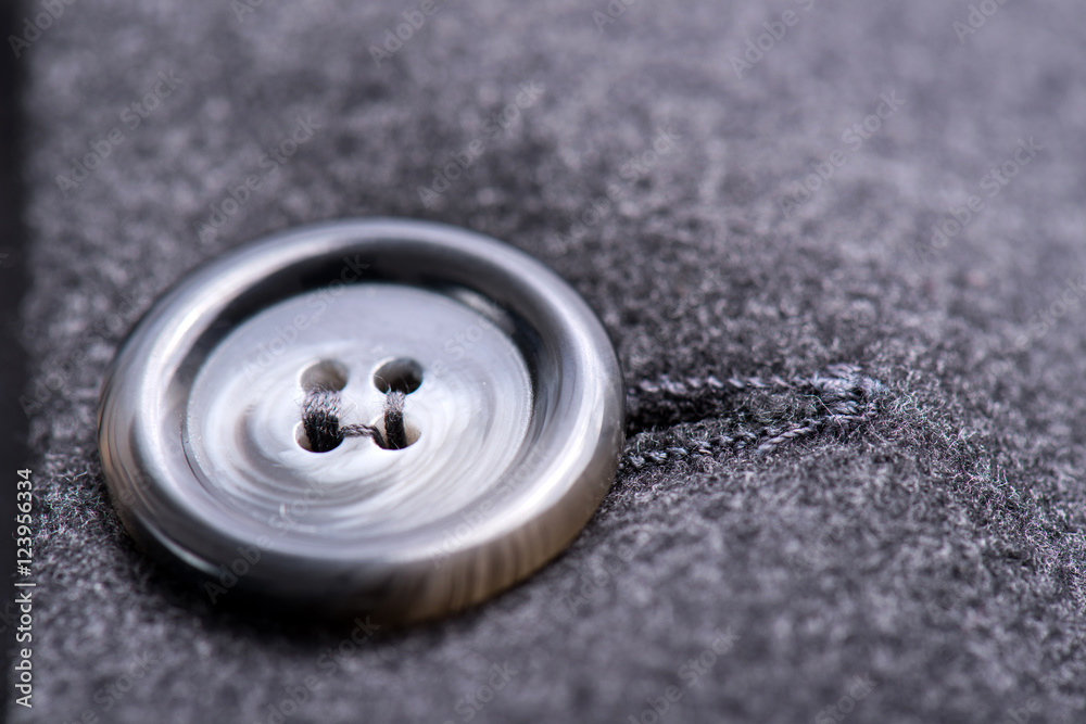 special buttons on the gray coat special buttons on the gray coat