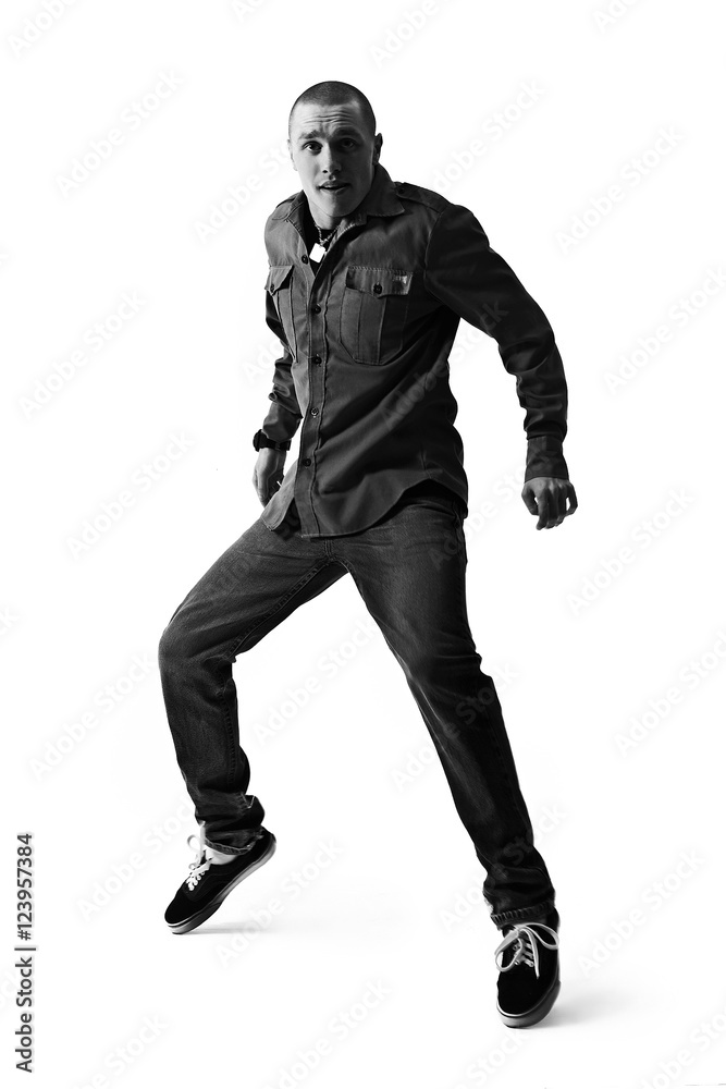 Dancing men on a white studio background. Dancing men on a white studio background.