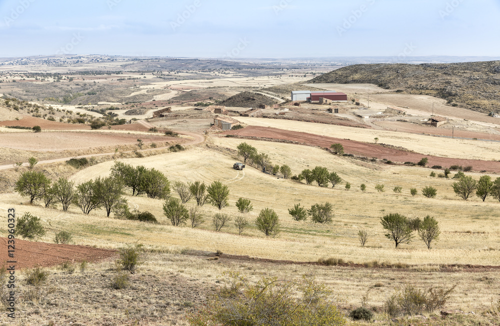 dry landscape with harvested fields on a summer day in Monforte de Moyuela, Teruel, Spain