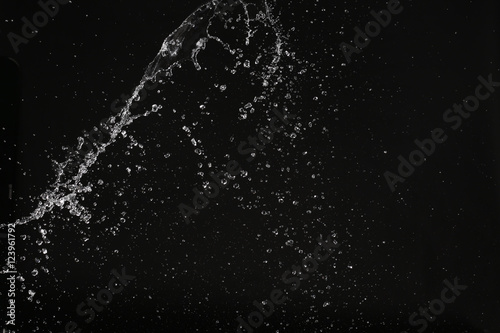 Water splash in space. Close up. Black background