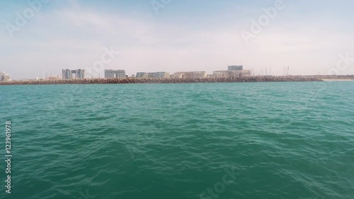 Boat tracking shot from the mediterranean sea of herzliya marina in israel.