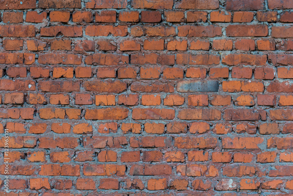 Naklejka premium Red old worn bricks wallpaper