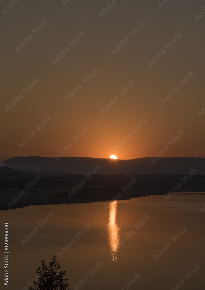 Sunset near Milada lake in summer evening Sunset near Milada lake in summer evening