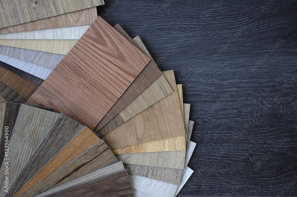 Laminate Wood Concept - Samples of laminate and vinyl floor tile on wooden Background wo - obrazy, fototapety, plakaty 