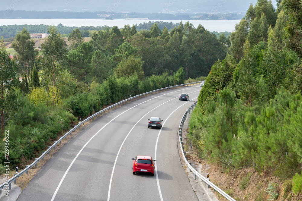 Fototapeta premium view of the turn of the highway between the mountains