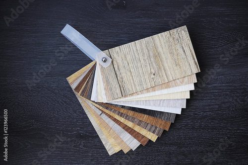 Laminated chipboards.Samples of laminate and vinyl floor tile on
