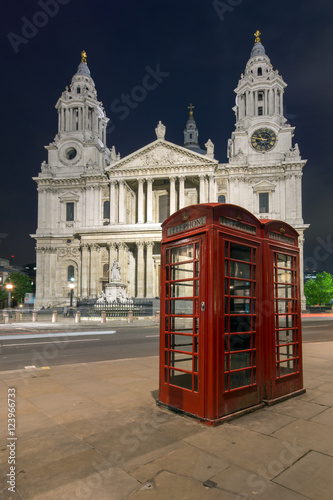 Night photo phone booth and St. Paul s Cathedral in London  Great Britain