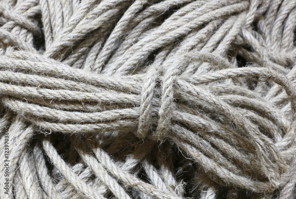 background of many skeins of raw cord fabric