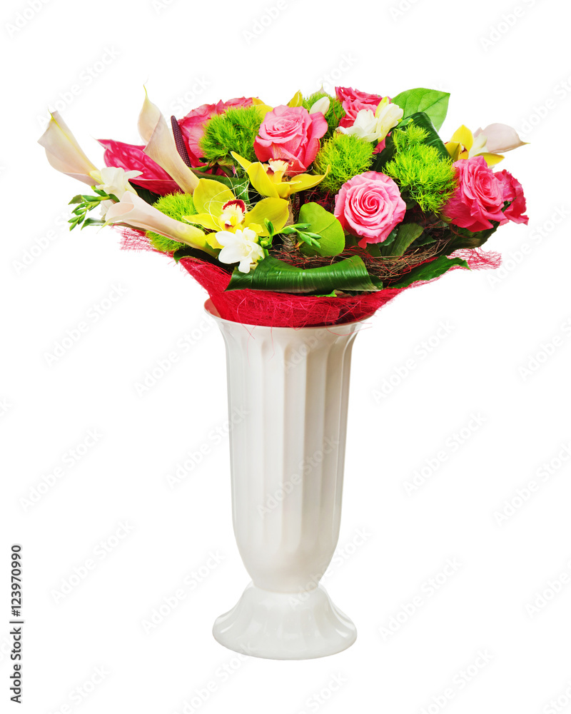 Colorful flower bouquet arrangement centerpiece in vase isolated on white background.
Closeup.