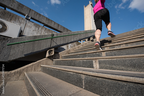 woman jogging on steps