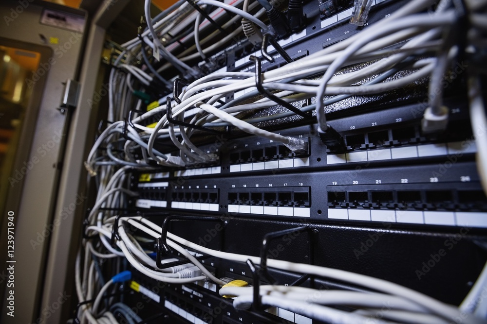 Technician connecting ethernet in socket Technician connecting ethernet in socket