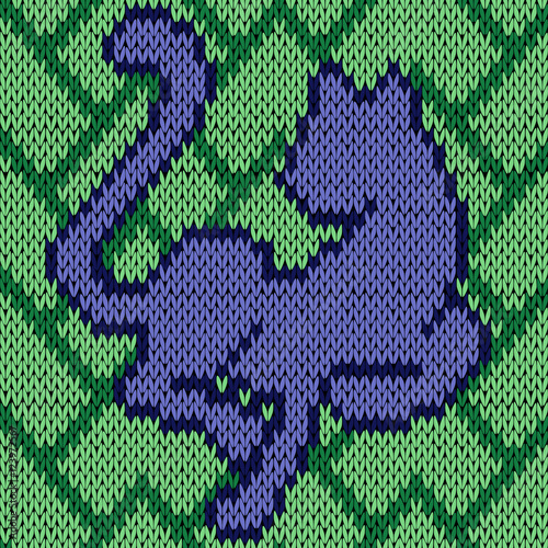 Knitting seamless pattern with blue cat over green