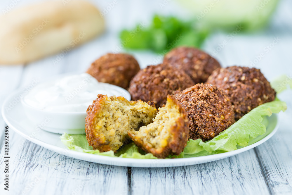 Wooden table with Falafels Wooden table with Falafels