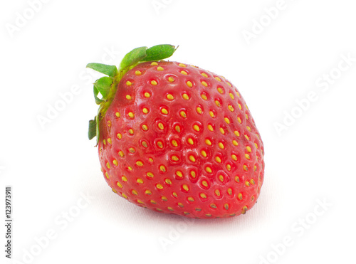 one red strawberry on white background studio shot 