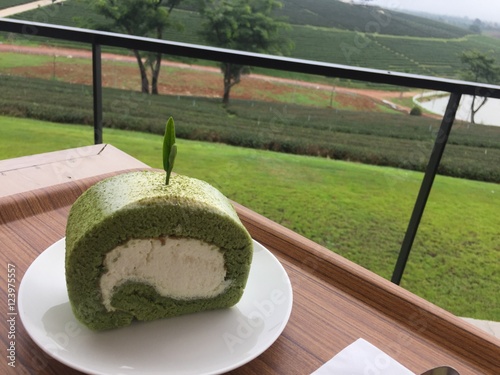 Jam roll green tea in tea farm.