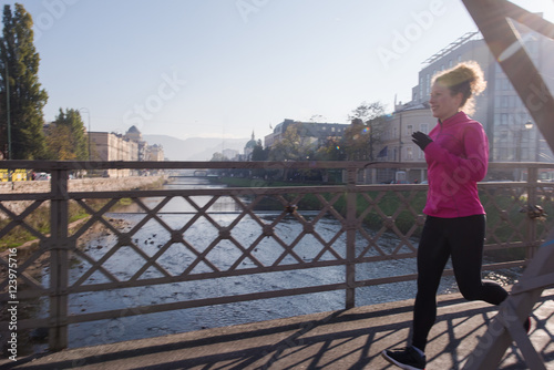 sporty woman jogging on morning
