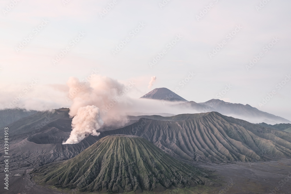 Mount Bro-mo is an active volcano and part of the Teng-ger mas-sif in East Java, Indonesia
