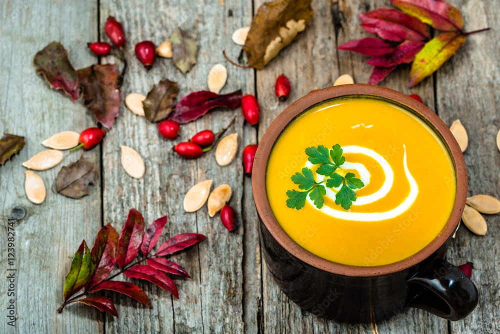 Pumpkin soup, autumn cooking, vegetarian dish Pumpkin soup, autumn cooking, vegetarian dish