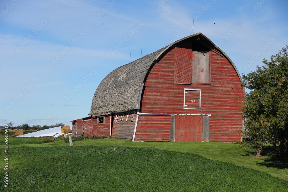 Tradition style old red barn on the farm Tradition style old red barn on the farm
