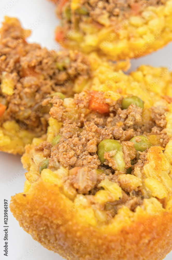 Arancini, sicilian rice balls stuffed with meat and peas Arancini, sicilian rice balls stuffed with meat and peas