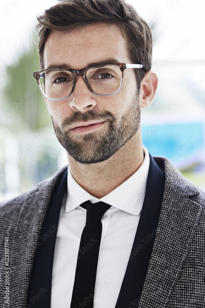 Smart businessman in shirt and tie, smiling Smart businessman in shirt and tie, smiling