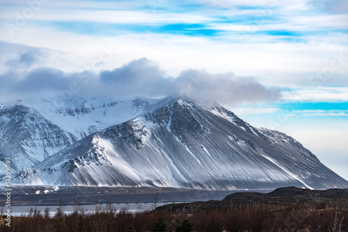 mountains near borgarnes at wintertime, west iceland photo