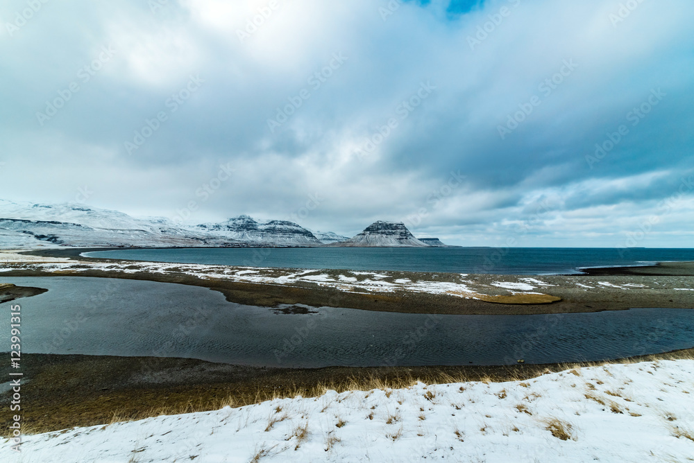 bay of grundarfjoerdur with mountain kirkjufell at wintertime, iceland