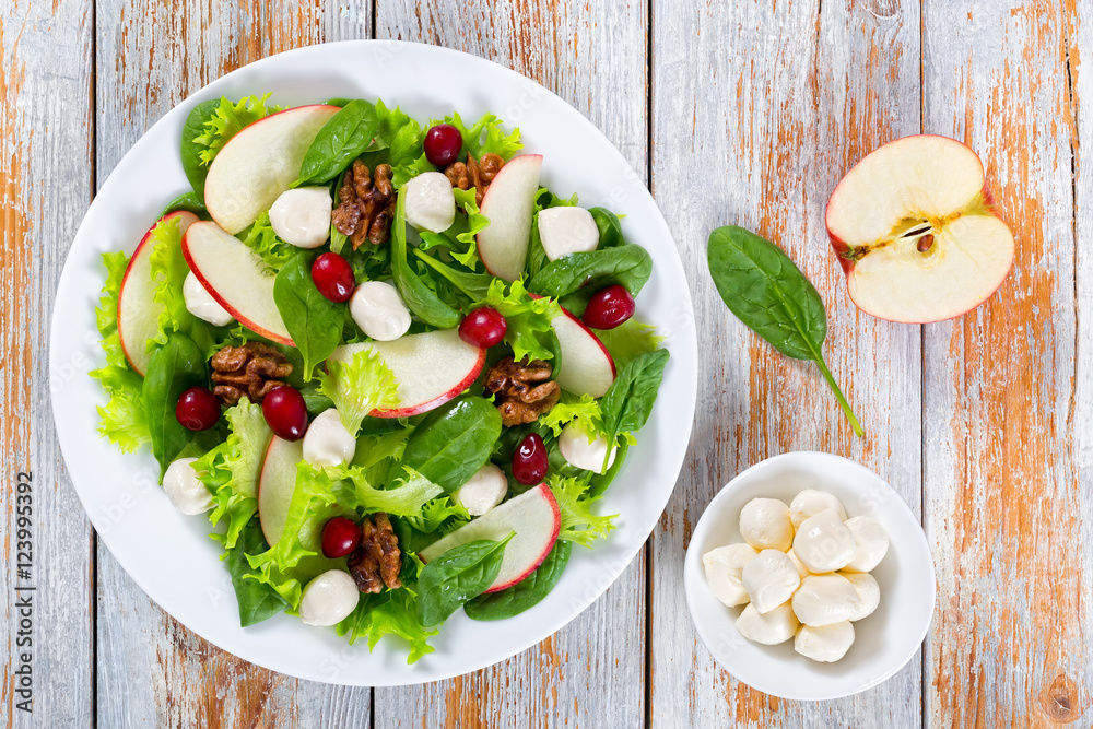  salad: apple, spinach, mini mozzarella balls, lettuce, walnuts
